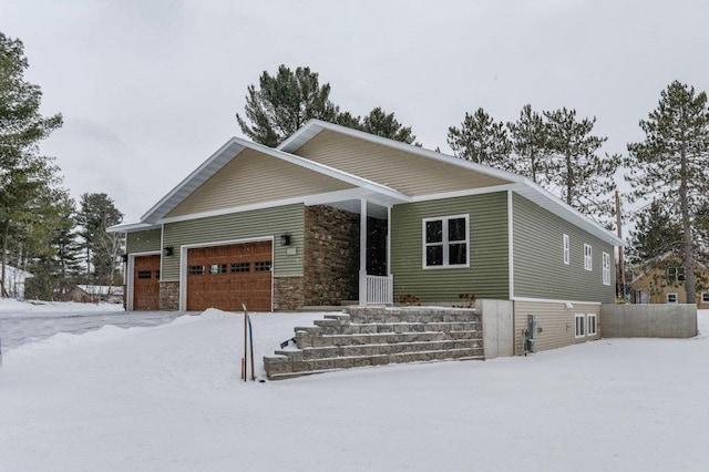 1003 E 10th St, Merrill, WI 54452 - view of front facade with an attached garage