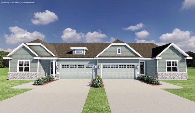 craftsman-style home with a front yard and a garage