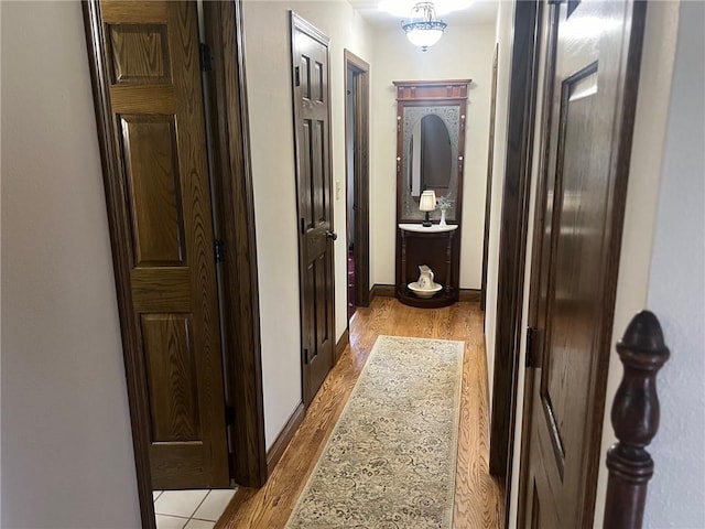 corridor featuring light wood-type flooring