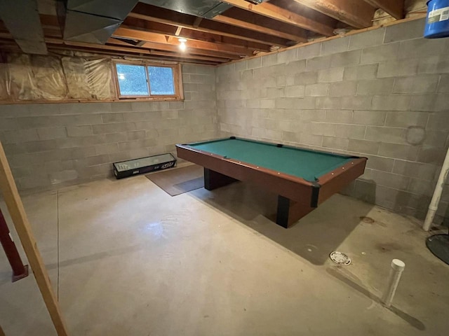 rec room with concrete floors