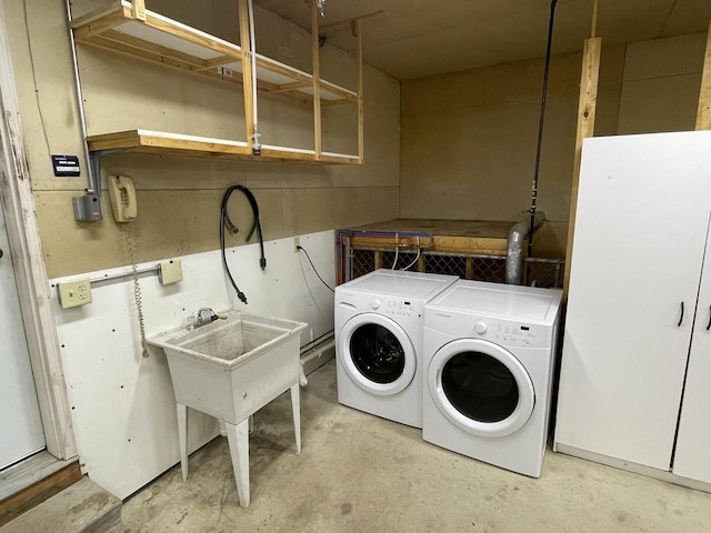 washroom with independent washer and dryer