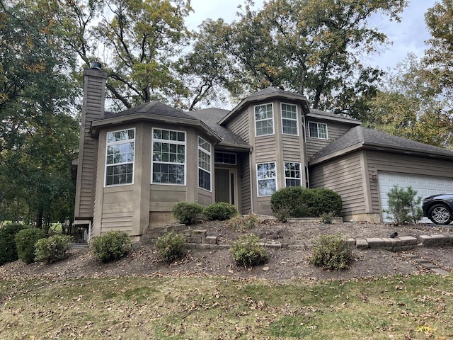 view of front of house with a garage