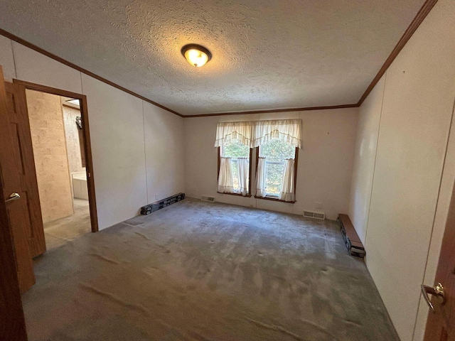 carpeted spare room featuring crown molding, a baseboard radiator, and a textured ceiling