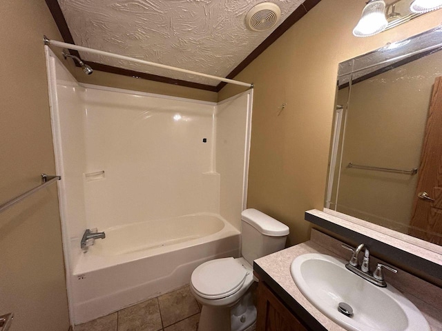 full bathroom with vanity, a textured ceiling, tile patterned floors, shower / bathing tub combination, and toilet