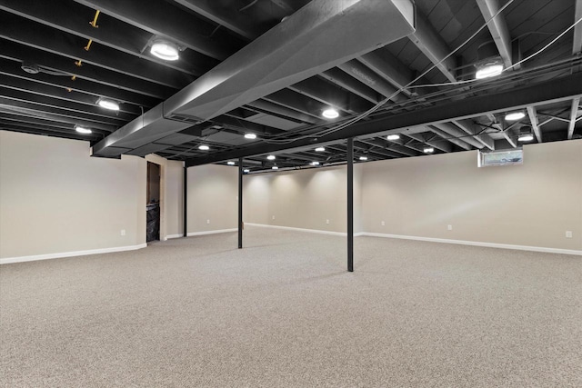 basement with carpet flooring