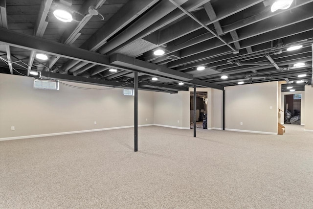 basement featuring carpet floors