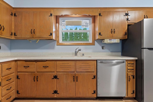 kitchen with stainless steel appliances and sink