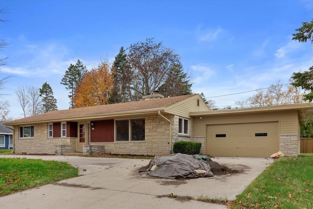 single story home featuring a garage