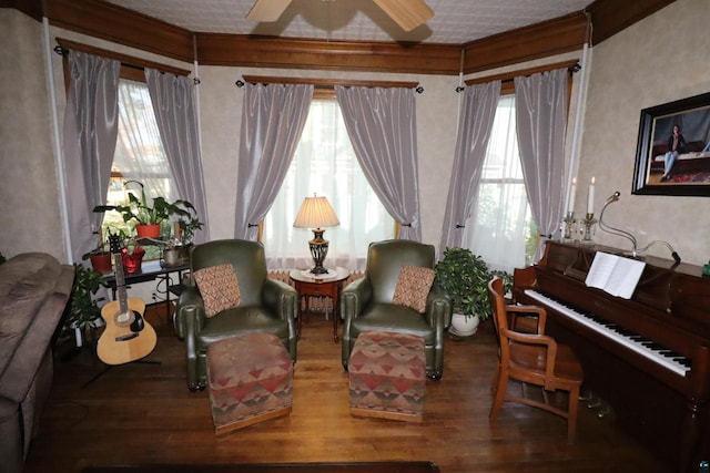 sitting room with hardwood / wood-style flooring