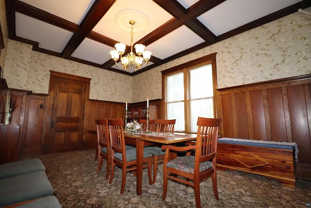 dining space with an inviting chandelier, beam ceiling, and coffered ceiling