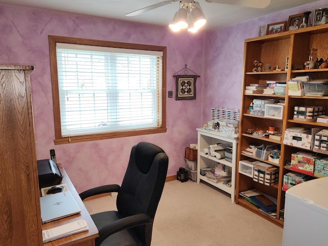 office featuring light colored carpet and ceiling fan