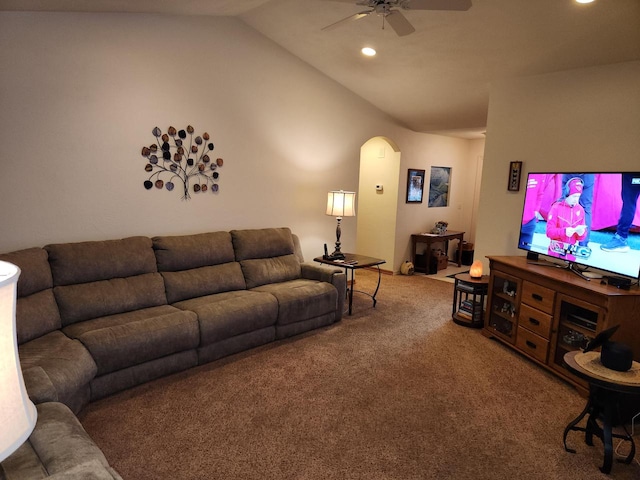 living room featuring lofted ceiling, carpet floors, and ceiling fan