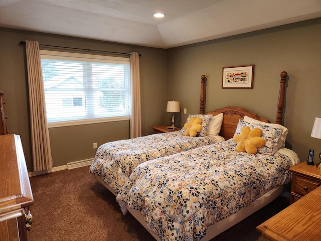 carpeted bedroom featuring lofted ceiling and a baseboard radiator