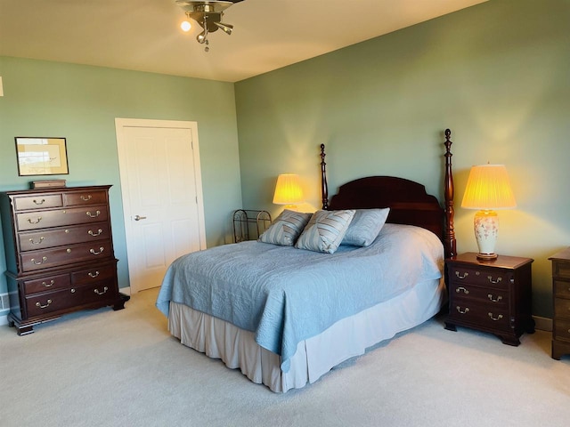 carpeted bedroom with a closet