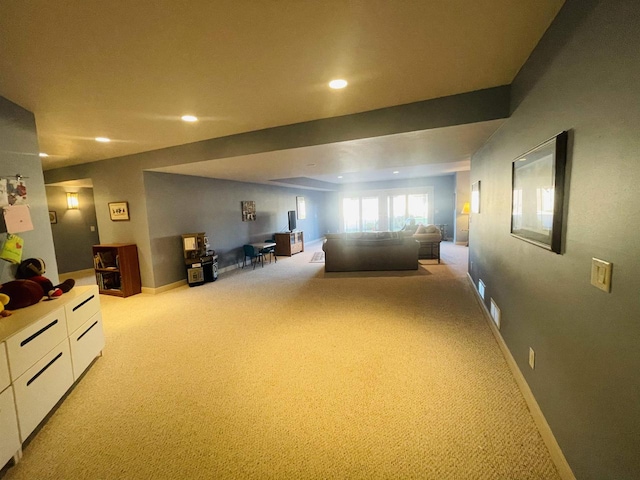 unfurnished bedroom featuring light carpet