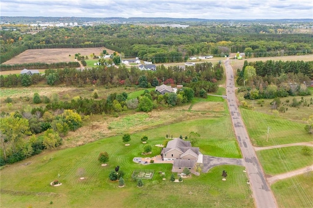 birds eye view of property with a rural view