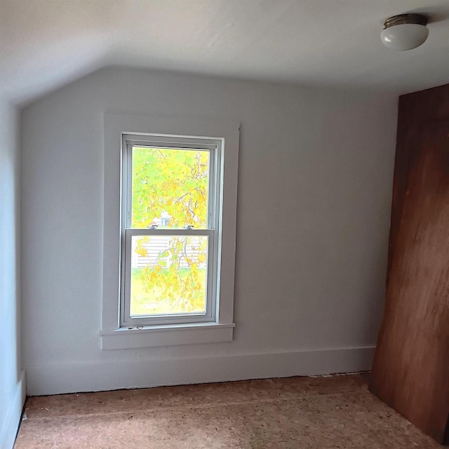 bonus room with vaulted ceiling