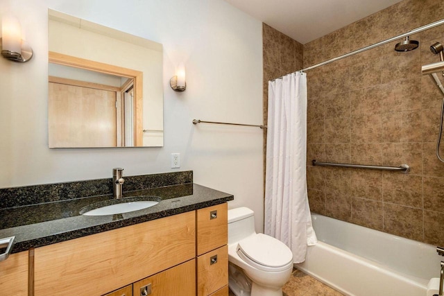 full bathroom with vanity, toilet, and shower / bath combo with shower curtain