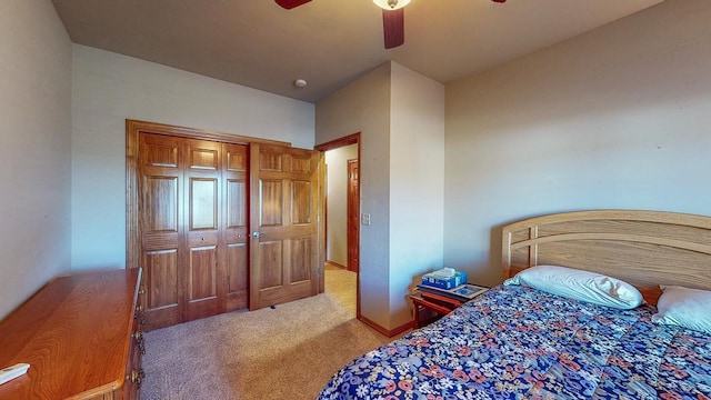 bedroom with light colored carpet and ceiling fan