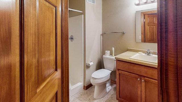 bathroom with tile patterned flooring, vanity, walk in shower, and toilet