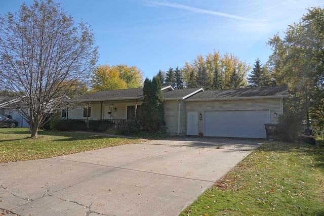 ranch-style house with a front yard and a garage