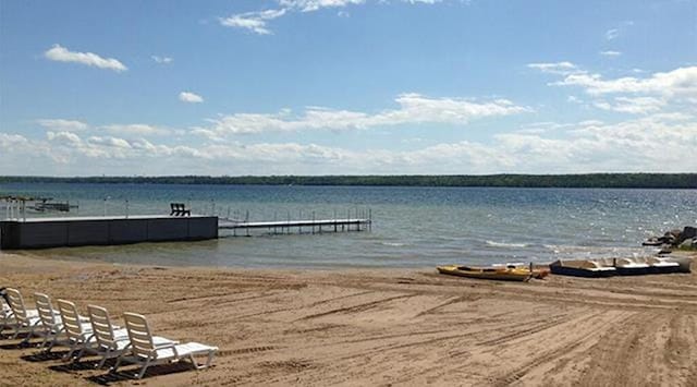 view of dock with a water view