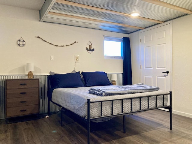 bedroom featuring dark wood-type flooring