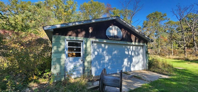 garage with a yard