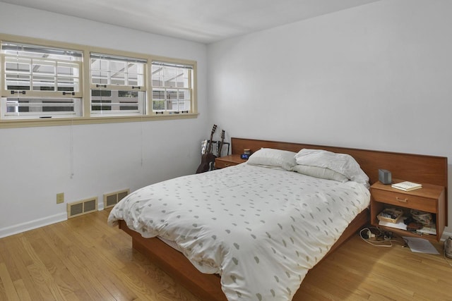 bedroom featuring light wood-type flooring