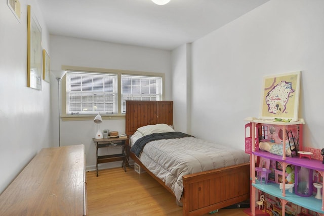 bedroom featuring light hardwood / wood-style flooring