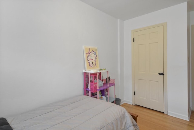 bedroom featuring light hardwood / wood-style floors