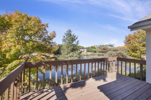 wooden terrace with a water view