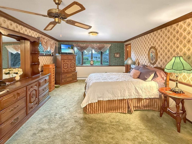 bedroom with light carpet, ornamental molding, and ceiling fan