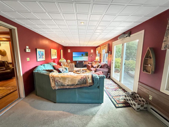 living room featuring carpet flooring and a baseboard radiator