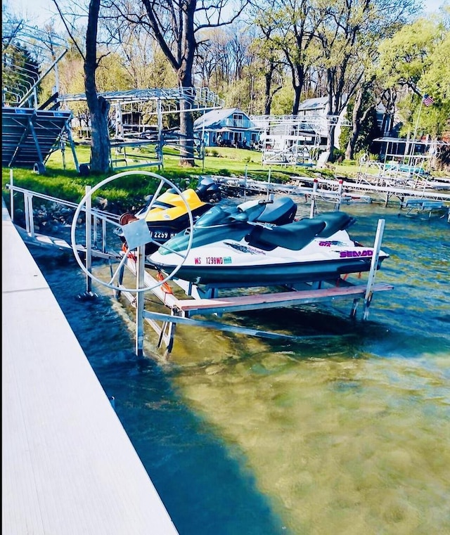 view of dock with a water view