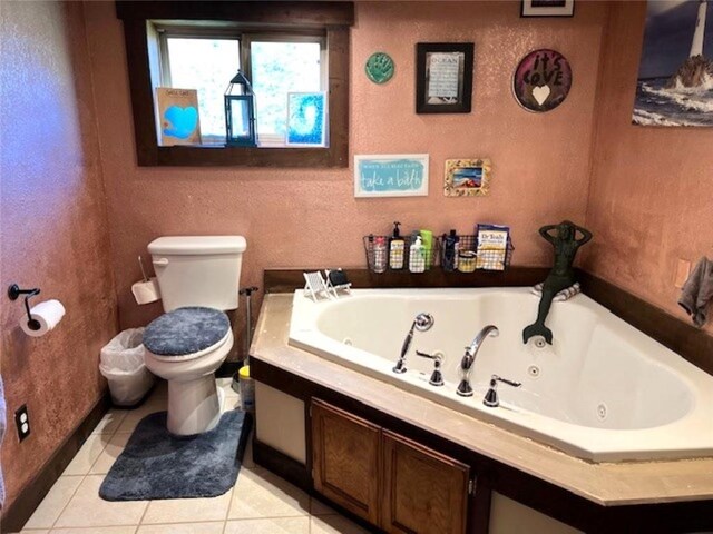 345 Old County D, Shell Lake, WI 54871 - full bathroom with tile patterned flooring, toilet, and a tub with jets
