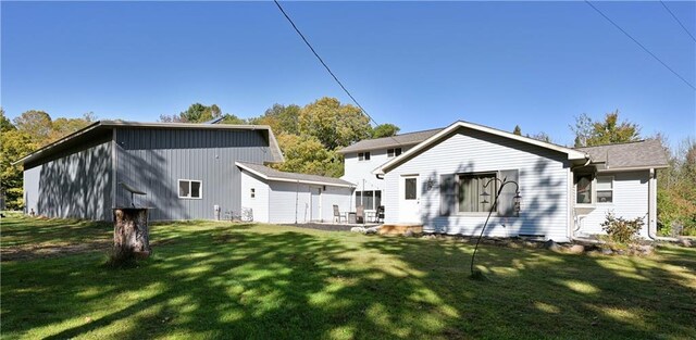 345 Old County D, Shell Lake, WI 54871 - back of house featuring a lawn