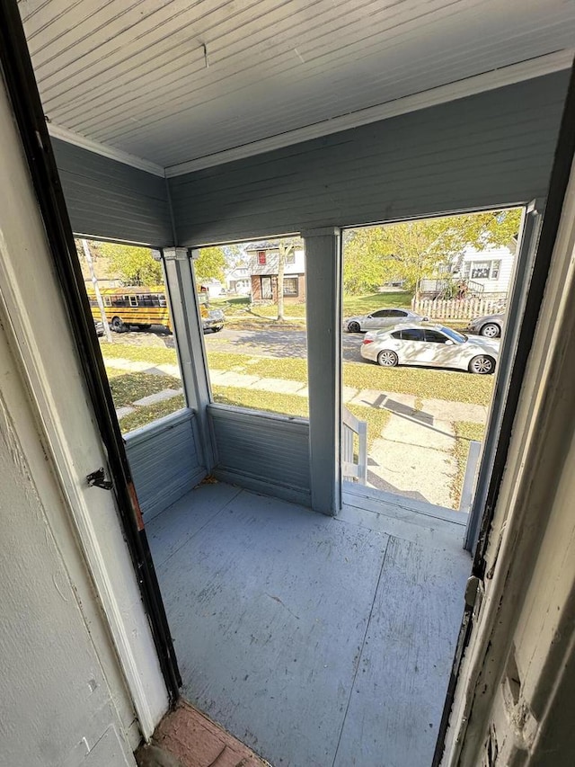 doorway to outside featuring plenty of natural light