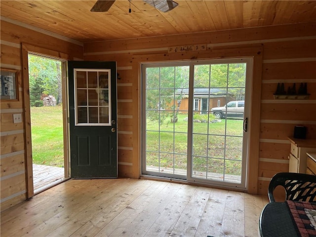 entryway with a healthy amount of sunlight, wood ceiling, light hardwood / wood-style floors, and ceiling fan