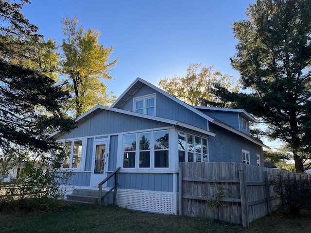 261 S Grant St, Adams, WI 53910 - view of front facade with fence