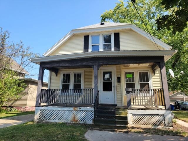 bungalow-style home with a porch