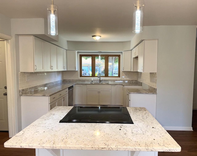 kitchen with sink, white cabinetry, dishwasher, black electric cooktop, and pendant lighting