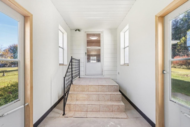 stairs with concrete floors