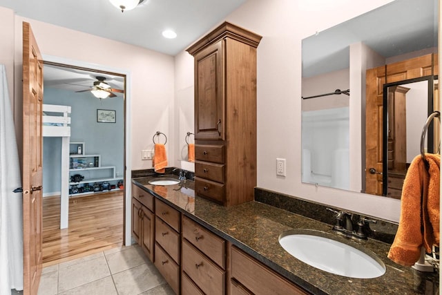 bathroom featuring vanity, hardwood / wood-style flooring, and ceiling fan