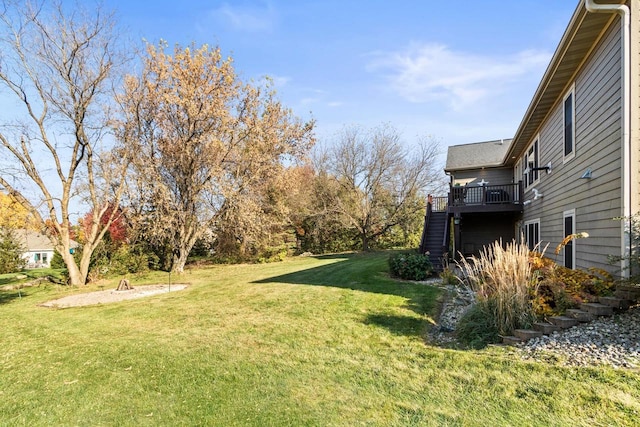 view of yard with a deck