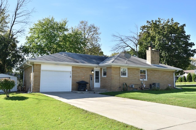 ranch-style home with a front yard and a garage