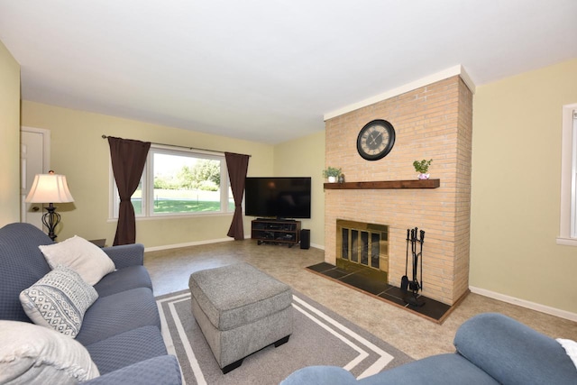 carpeted living room with a fireplace