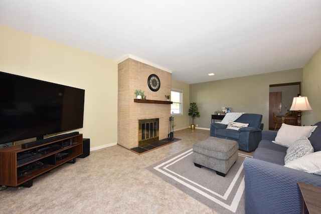 carpeted living room with a brick fireplace