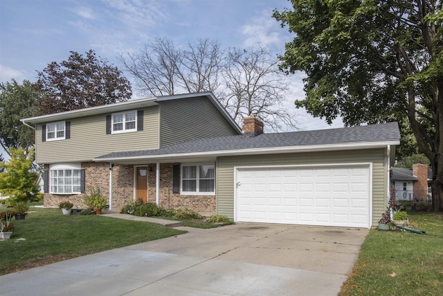 front facade with a front lawn and a garage