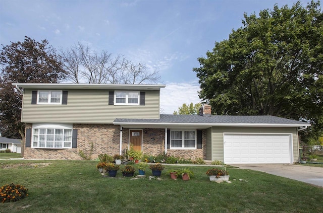 view of front property featuring a garage and a front lawn